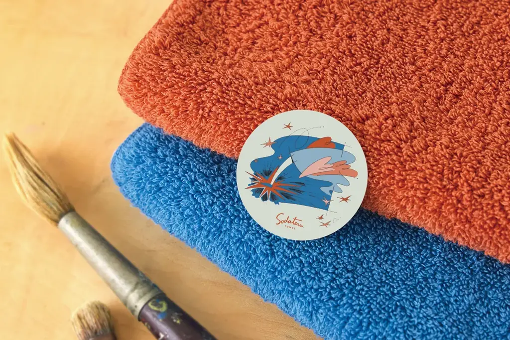 【育てるタオル】2026年限定カラー“ADVENTURE”登場。若手アーティストOno氏と描く、未来へ踏み出す2色「feel Two for you ADVENTURE」1月28日発売 画像 9