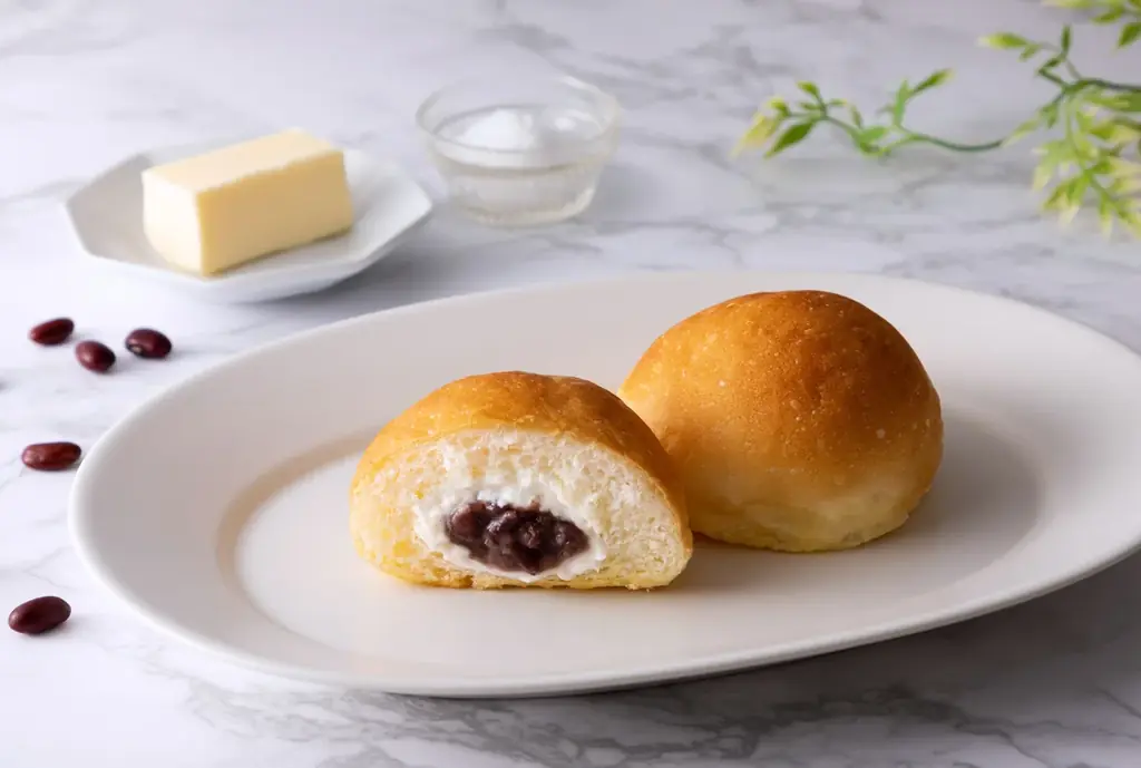 名古屋限定「塩バターくりーむパン みるくあん」新発売！名古屋名物【あんバター】を塩バター生地とクリーム＆あんこの甘じょっぱい魅惑の味わいに 画像 1