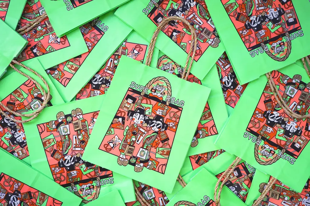 ギブミ～！トモタカ×SUPERBAG 極彩色ショッパー無償配布