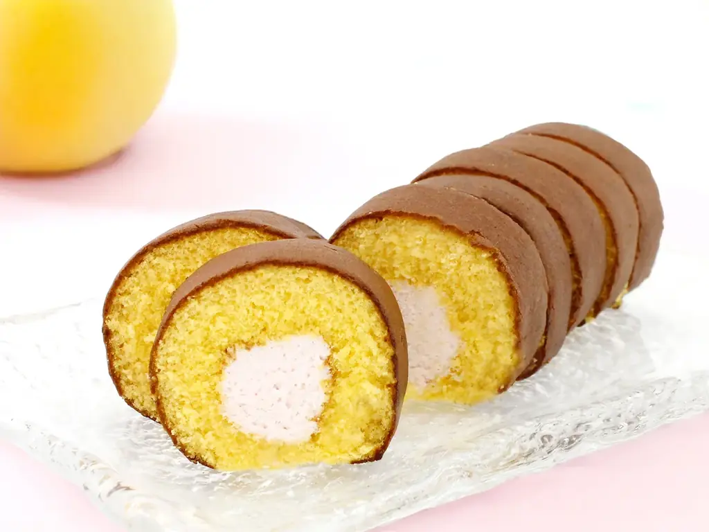 洋菓子メーカー（株）サンラヴィアン「黄福ろうる 七宝巻」シリーズから夏限定登場 岡山県産白桃ピューレ使用の新商品発売 画像 1