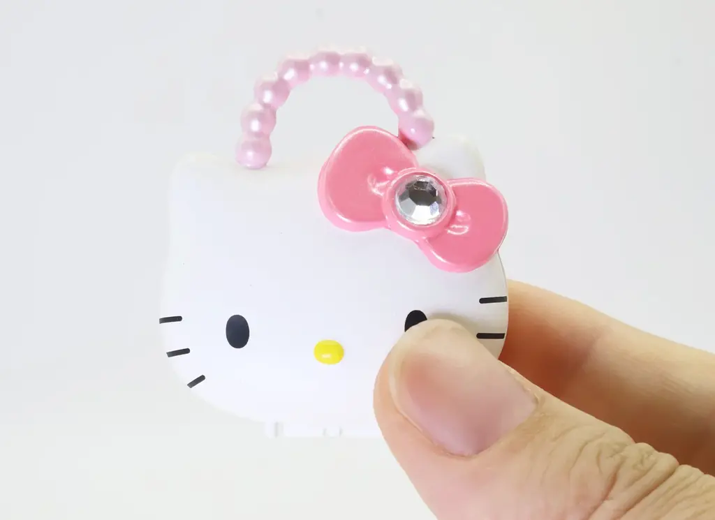 ロングセラー「ムラオカ」のおもちゃが手のひらサイズに。​『ハローキティ かわいいおもちゃ ミニチュアチャーム』​2026年8月中旬 発売予定​ 画像 5