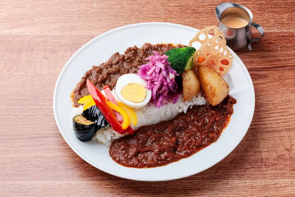 神田カレーグランプリ2025「史上初W受賞」のカレーが進化　神保町オオドリー、10月1日から全11種のトッピングを解禁 画像 2