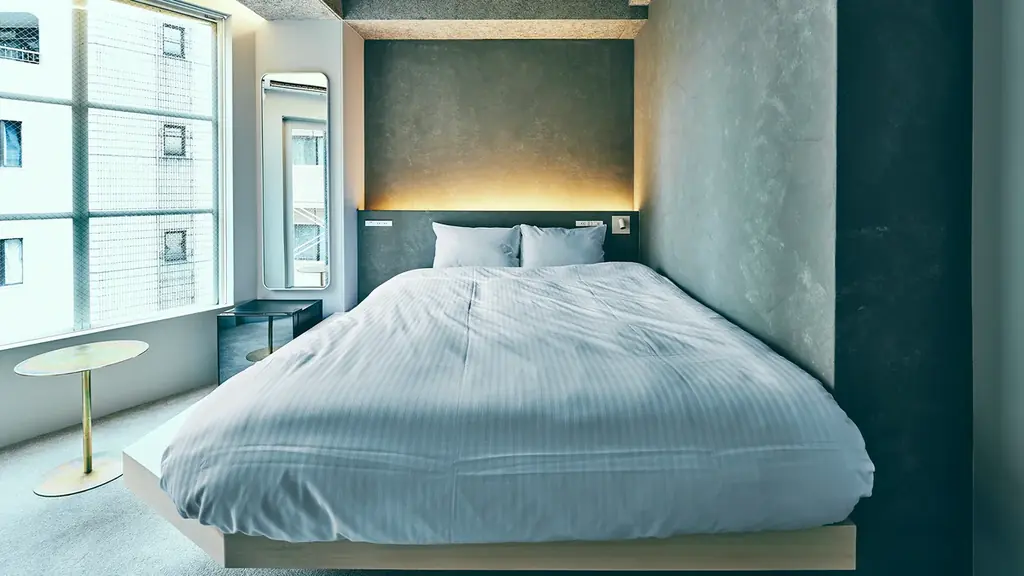 築30年の空きビルを塗装技術で蘇らせたシェア型ホテル「HOTEL URO」2025年8月1日開業 画像 4