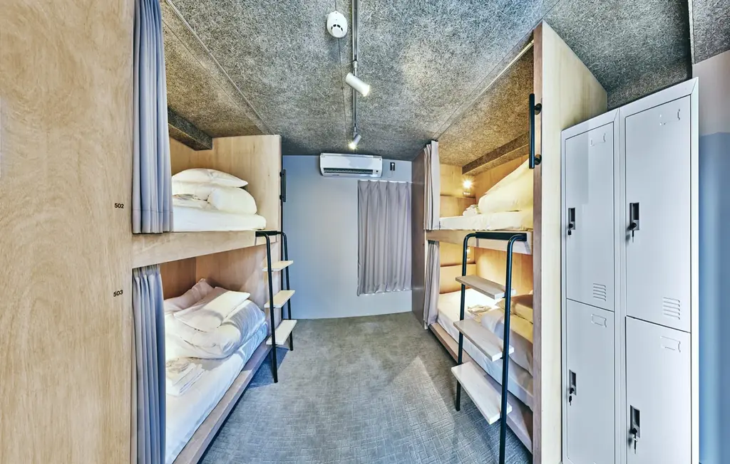 築30年の空きビルを塗装技術で蘇らせたシェア型ホテル「HOTEL URO」2025年8月1日開業 画像 6