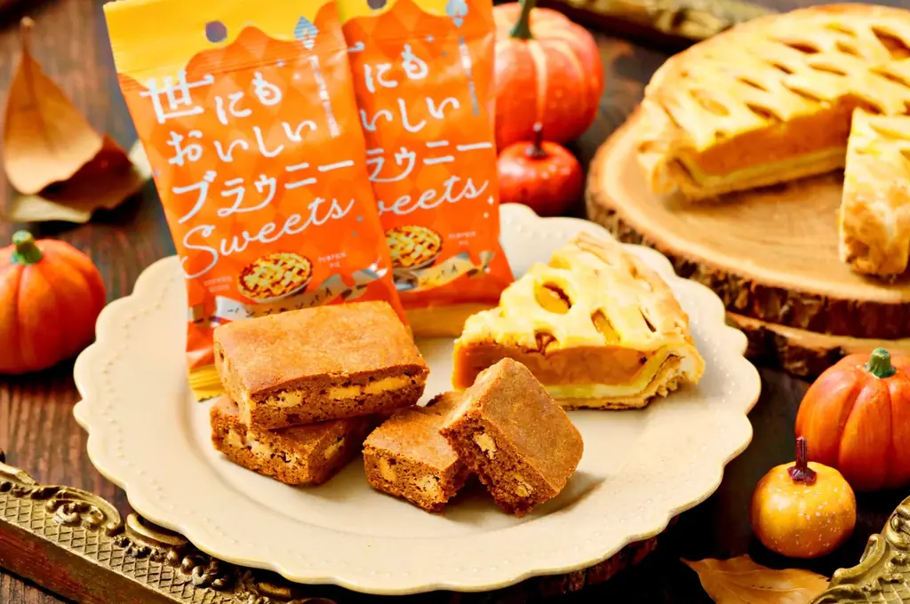 【秋の芋栗スイーツ】「世にもおいしいチョコブラウニー」より秋の味覚を楽しめる“パンプキンパイ”、“スイートポテトタルト”の季節フレーバーが新登場！フレーク入りチョコチップのザクザク食感でご褒美気分に 画像 1
