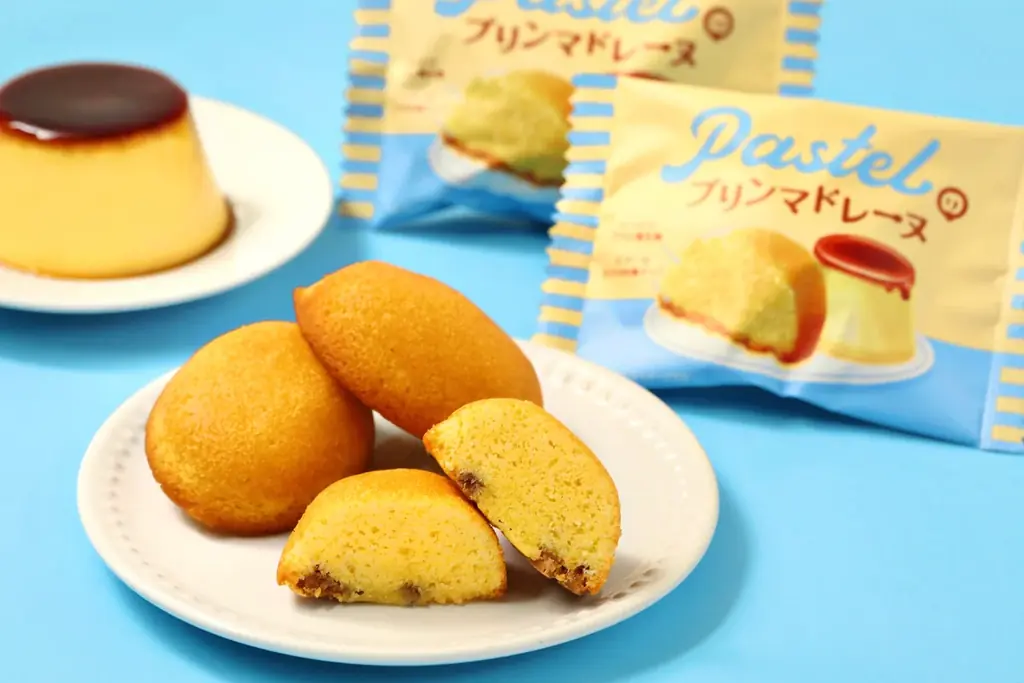 【プリン×マドレーヌ】“なめらかプリン”ブームの火付け役「パステル」から『パステルのプリンマドレーヌ』が登場！プリン風味のしっとり生地とザクザク食感のカラメルチップを楽しめる新作マドレーヌ！ 画像 1