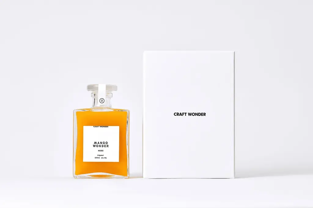 日本のクラフト酒造と造るプレミアムアルコールブランド「CRAFT WONDER」より、第四弾となるエレガンスを極めたマンゴーリキュールが2025年8月下旬販売開始 画像 1