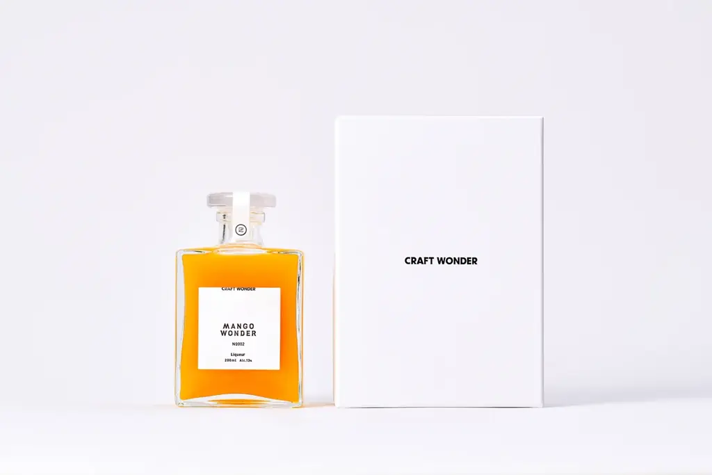 日本のクラフト酒造と造るプレミアムアルコールブランド「CRAFT WONDER」より、“幻のキーツマンゴー“を使用した極上マンゴーリキュール第二弾が2025年9月26日に150本限定で発売 画像 1