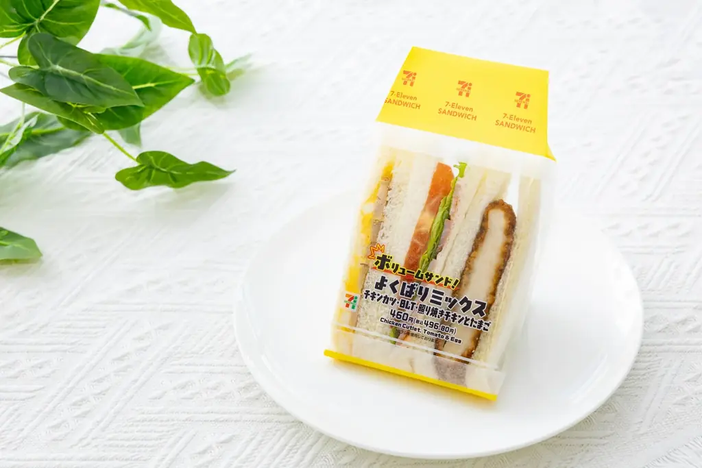 人気具材を贅沢にサンド！ボリューム満点「よくばりミックス」が新登場　10月22日（水）より全国のセブン‐イレブンで順次販売　照り焼きチキン・たまご・ベーコンレタス&トマト・チキンカツを一度に楽しめます 画像 2