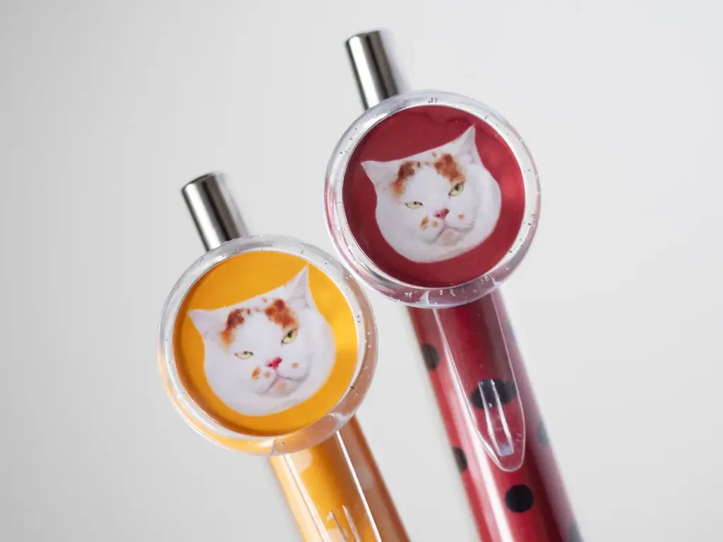 あの猫とお父さんの攻防がまさかのグッズ化　写真集『メイ先輩』特大パネルも登場 画像 13