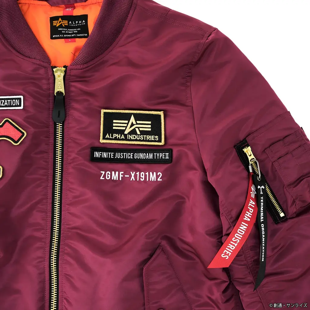 『機動戦士ガンダムSEED FREEDOM』から、ALPHA INDUSTRIESとのコラボによる、新作フライトジャケットMA-1 NATUSが登場、アクリルスタンドプレゼントキャンペーンも実施！ 画像 4