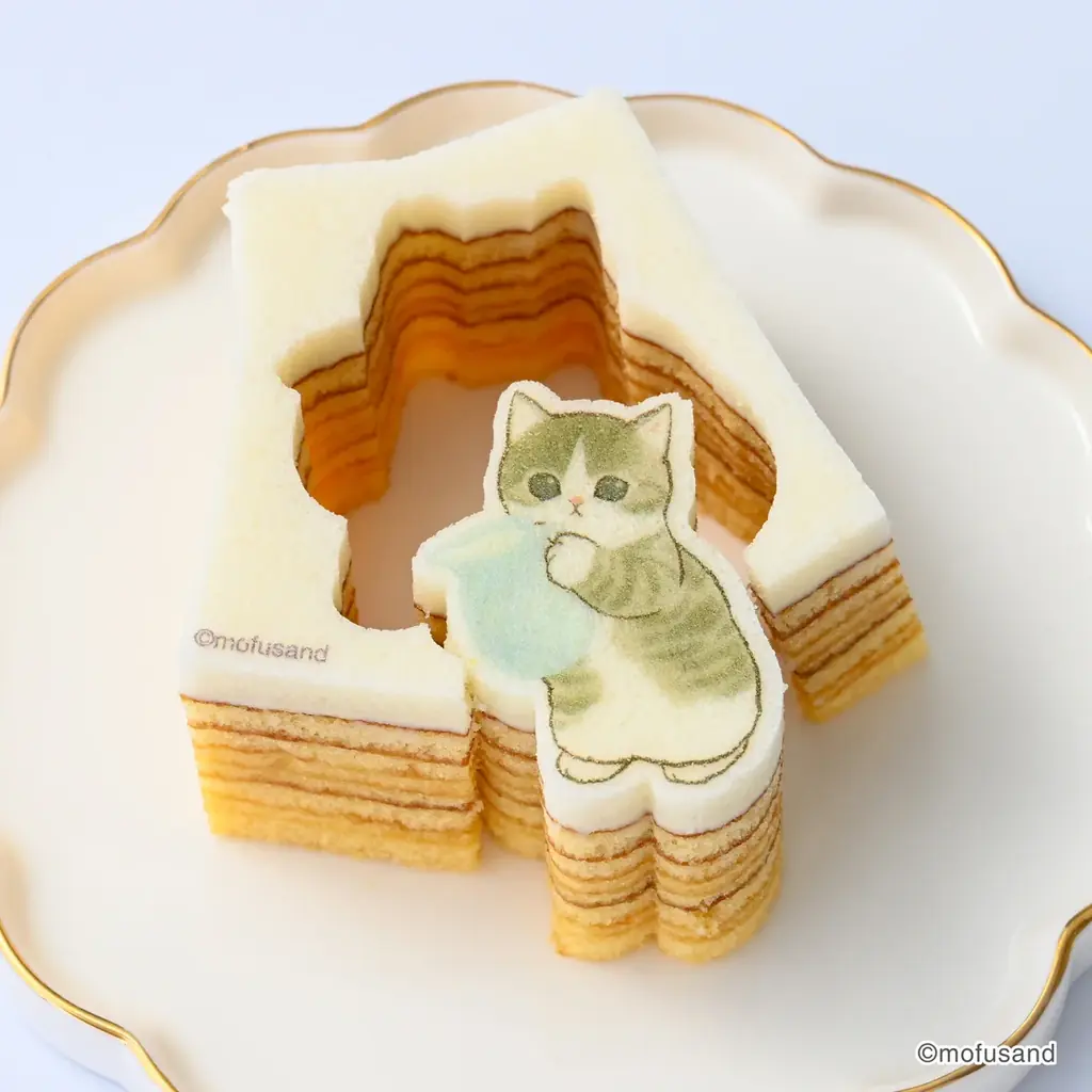 あの「mofusand」がスイーツに！　もふもふにゃんこの“かたにゃきバウム”新発売 画像 13