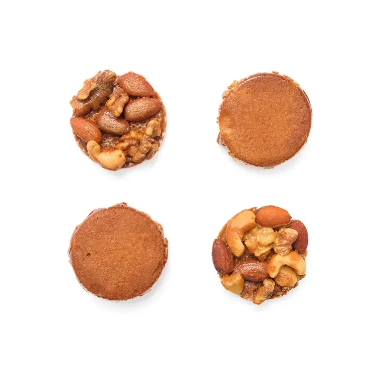 甘さの奥にほんのり塩味。濃厚キャラメルとナッツの旨みを閉じ込めた『香ばしキャラメルナッツタルト』をスナックミーオンラインストアで期間限定発売 画像 4