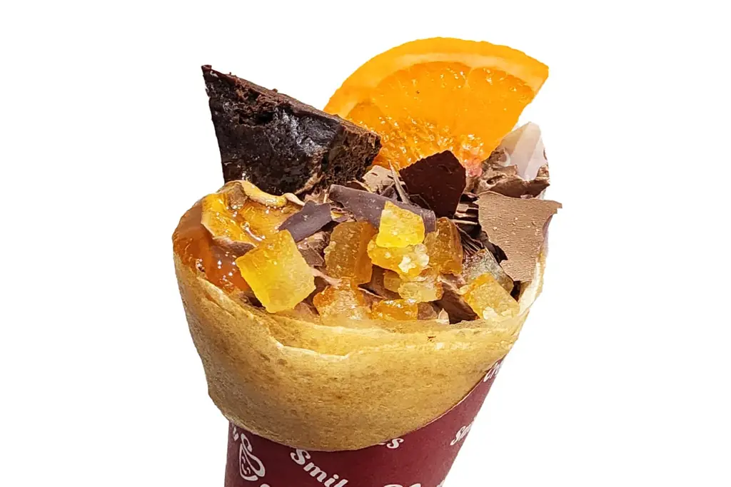 【スマイリークレープ】濃厚ショコラ× 柑橘！冬季限定の新商品『ショコラオランジュクレープ』2025年12月20日（土）より発売を開始 画像 2